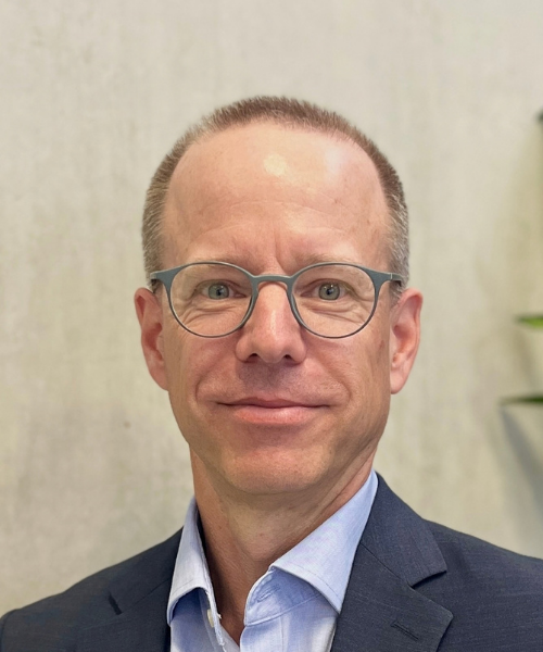 Dr Karsten Heuser